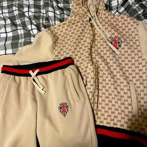 Tan Gucci suit. It fit great but I lost weight recently and it’s too big for me